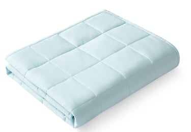 Light blue weighted blanket folded neatly with quilted stitching on a white background.