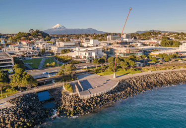 New Plymouth city skyline looking south from the foreshore with Mount Taranaki on the horizon.