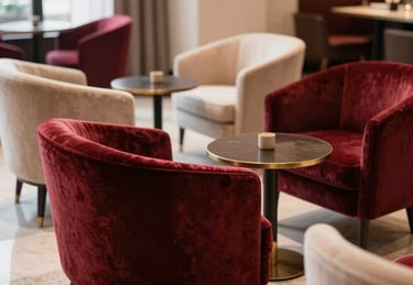 Elegant hotel lobby lounge chairs upholstered in rich velvet, soft ambient lighting, sophisticated atmosphere