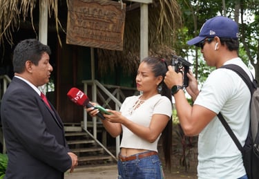TV news crew interviewing Manuel Vasquez from the Ministry of Culture Ucayali