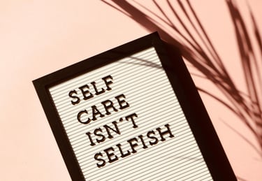 a self - care isn't selfish sign