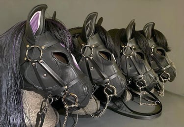 line of 4 leather horse mask hoods