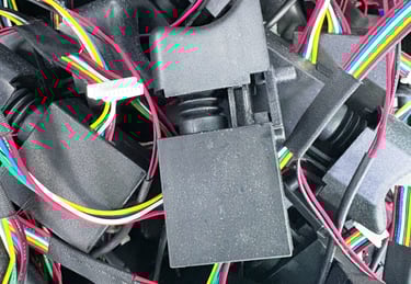 a pile of wires and wires connected to a computer