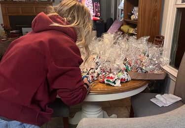 volunteer packaging cookies for seniors