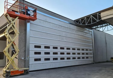 Portone ad impacchettamento verticale