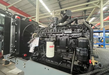 a large engine on a large machine in a factory