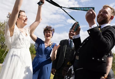 a wedding couple handfasting