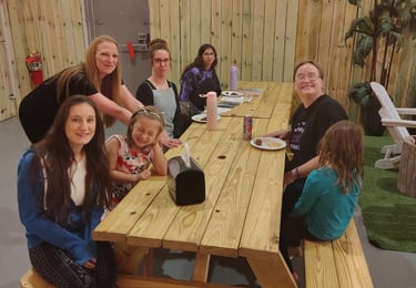 The women eating snacks after our Sunday church service