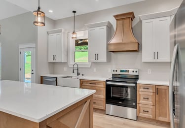 Kitchen vent and beautiful design of new construction home