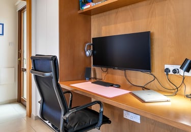 Work-from-home desk with large screen at Theseus Retreat holiday rental in Cyprus