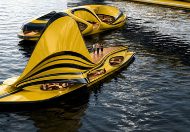 Modern luxury yellow and black yacht with futuristic aerodynamic design floating on Sama Karim