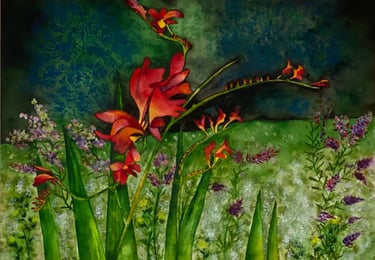 Bursting red, orange and yellow flowers in delightful Spring amid vivid greens of many shades