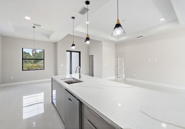 photo of island with calacata marble