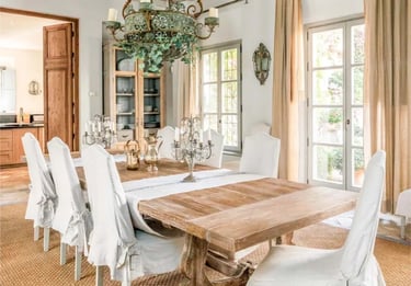 Dining room with rustic chandelier at Finca Santa Katerina