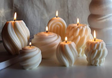 Molded white wax scented candles