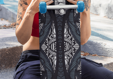 a woman sitting on steps with a skateboard