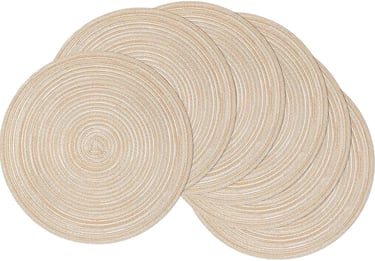 a set of four round placemats with a circular design