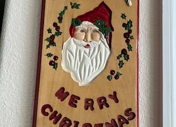 Carved by Tom Anstett