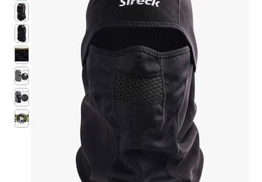 a black and white photo of a face mask with the word street style
