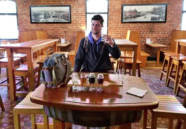 Steven enjoys a tasty beverage at Pomeroy's in Christchurch, New Zealand