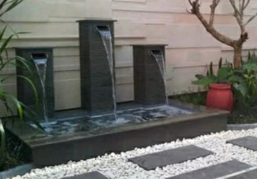 dekorasi dan hiasan rumah dan taman dengan 3 air mancur.