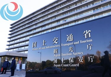 a man walking past a large building with a large sign that says,