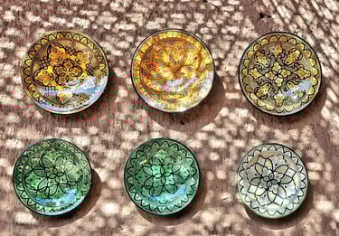 Selection of ceramic plates made in traditional fashion in Tamegroute, stop on Marrakech to M'hamid 
