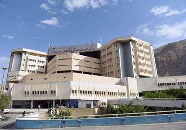 a large building with a large building in the background