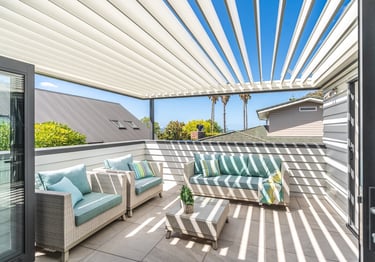 Outdoor living room louvered roof - Kohimarama Rd home renovation - Revive Builders Auckland