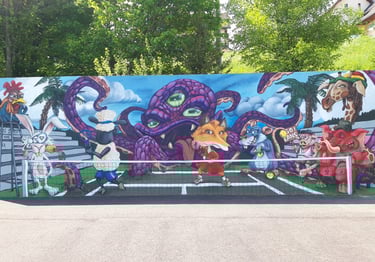 Initiation graff aec activ'Ados sur Lans en Vercors. Thème : la caricature, sur le mur de tennis.