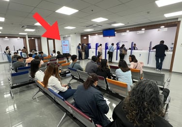 alt="digital advertising screen inside Visa Center waiting area Philippines in Metro Manila"