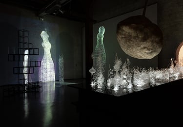 a room with video mapping and a lot of glass sculpture