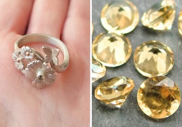 a person's hand holding a ring with a flower