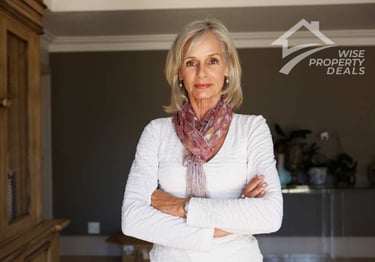 a woman in a white shirt and scarf