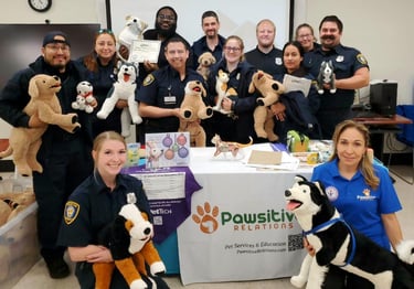 Animal control offices learning about Pet CPR