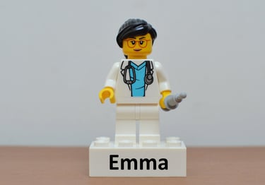 a lego - style lego - man with a name tag on it