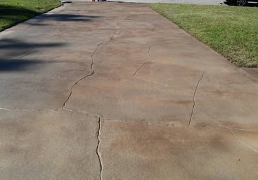 a skateboarder is riding his skateboard down a sidewalk