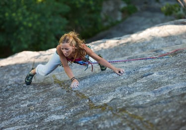 Laura dealing with friction climbing in val di mello