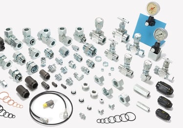 Photograph of hydraulic Ermetto fittings & accessories, versatile components utilized in hydraulics