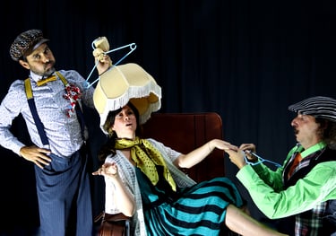 a man and woman in costumes on stage