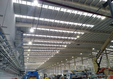 a large warehouse with a lot of machinery and equipment