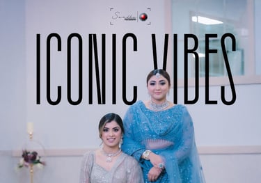 a couple of women in blue dresses and a man in a blue suit