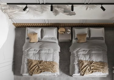 two beds in a bedroom with a wooden headboard Nour Nagy Designs