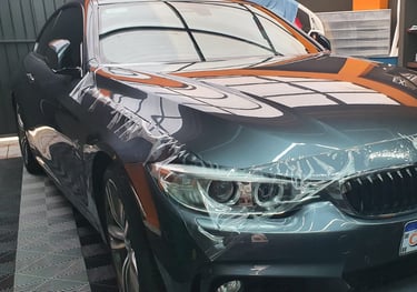 a car that is being PPF aplication