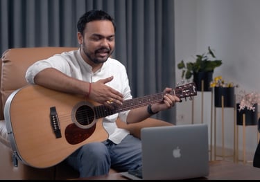 Musicwale's teacher teaching guitar on online classes