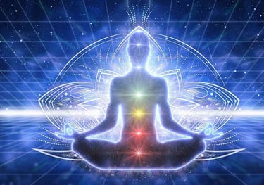 a person sitting in a lotus position with a glowing light shining in the background