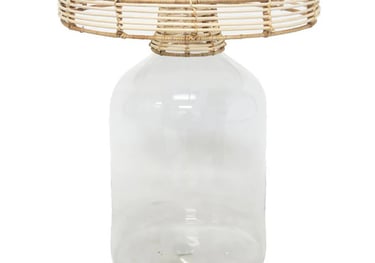 a blown glass side coffee table with a rattan on top of it