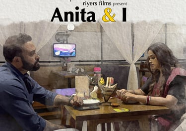 a man and woman sitting at a table with a man in a blue shirt