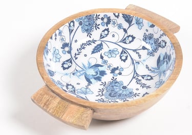 a blue and white wooden bowl for serving