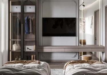 a bedroom with a tv and a bed in the middle of the room Nour Nagy Designs